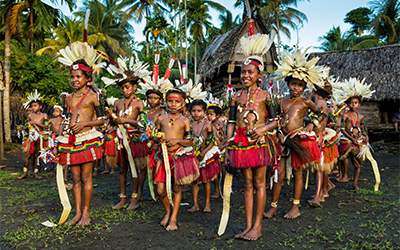 Children performing the Wosi Mwaya dance at the Milamala festival Kiriwina, 2018 (Hemis/Alamy)